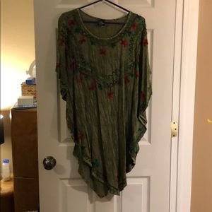 Green blouse boho style with embroidery.